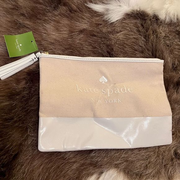 kate spade Handbags - Kate Spade Large Tassel Pouch NWT